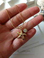 Goldene Seestern Kette mit grünem Naturstein