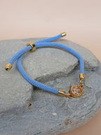 Kordel Armband Hellblau mit Flussstein Anhänger